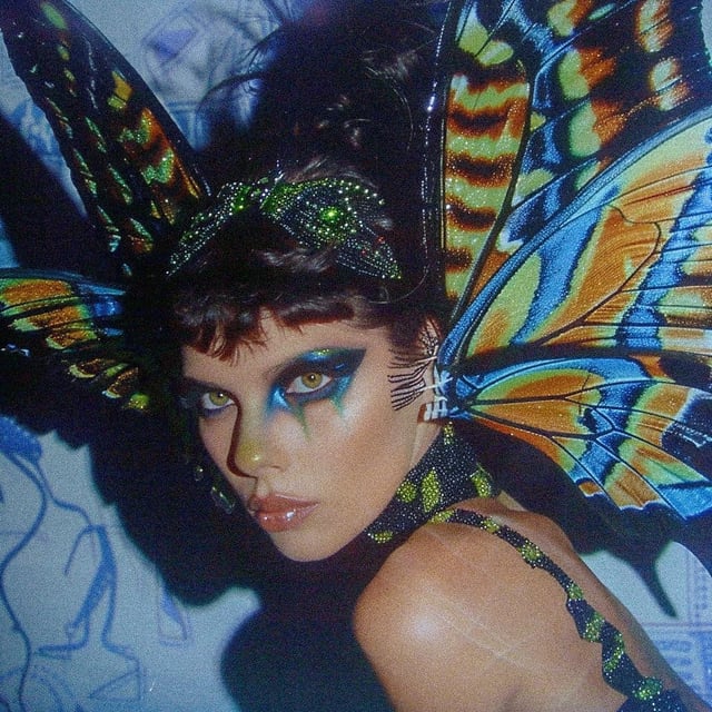 user_10/butterfly-woman-v0-emelf76kb3jc1_0a83a523-0fb9-40e0-9fd3-aca45eb57319.jpg